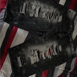Black Relaxed Distressed Jeans with Heavy Fraying
